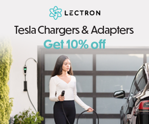 Driver using a Lectron charging adapter near a home garage